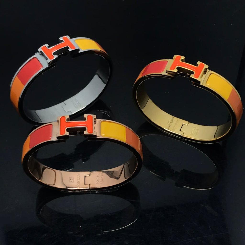 „Dream“-Armband aus orangefarbener Keramik mit Regenbogenfarben