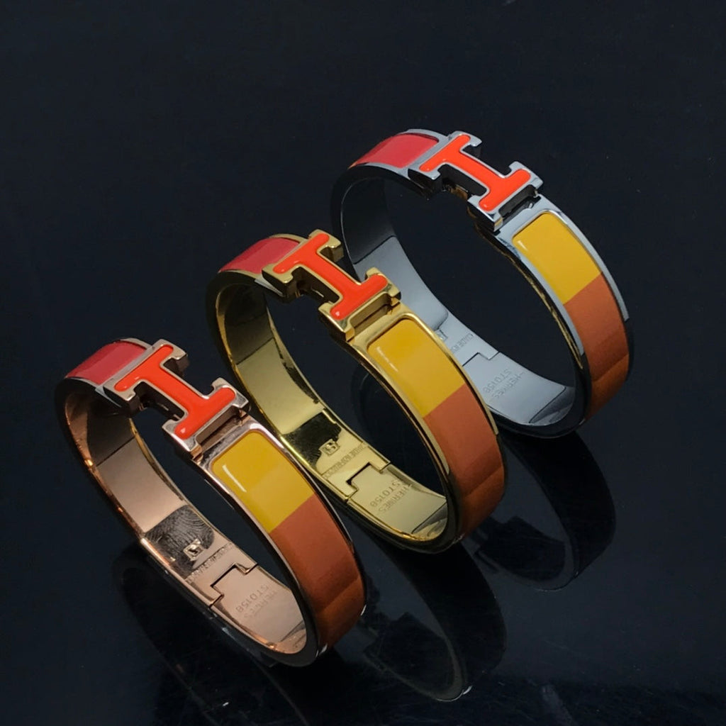 „Dream“-Armband aus orangefarbener Keramik mit Regenbogenfarben
