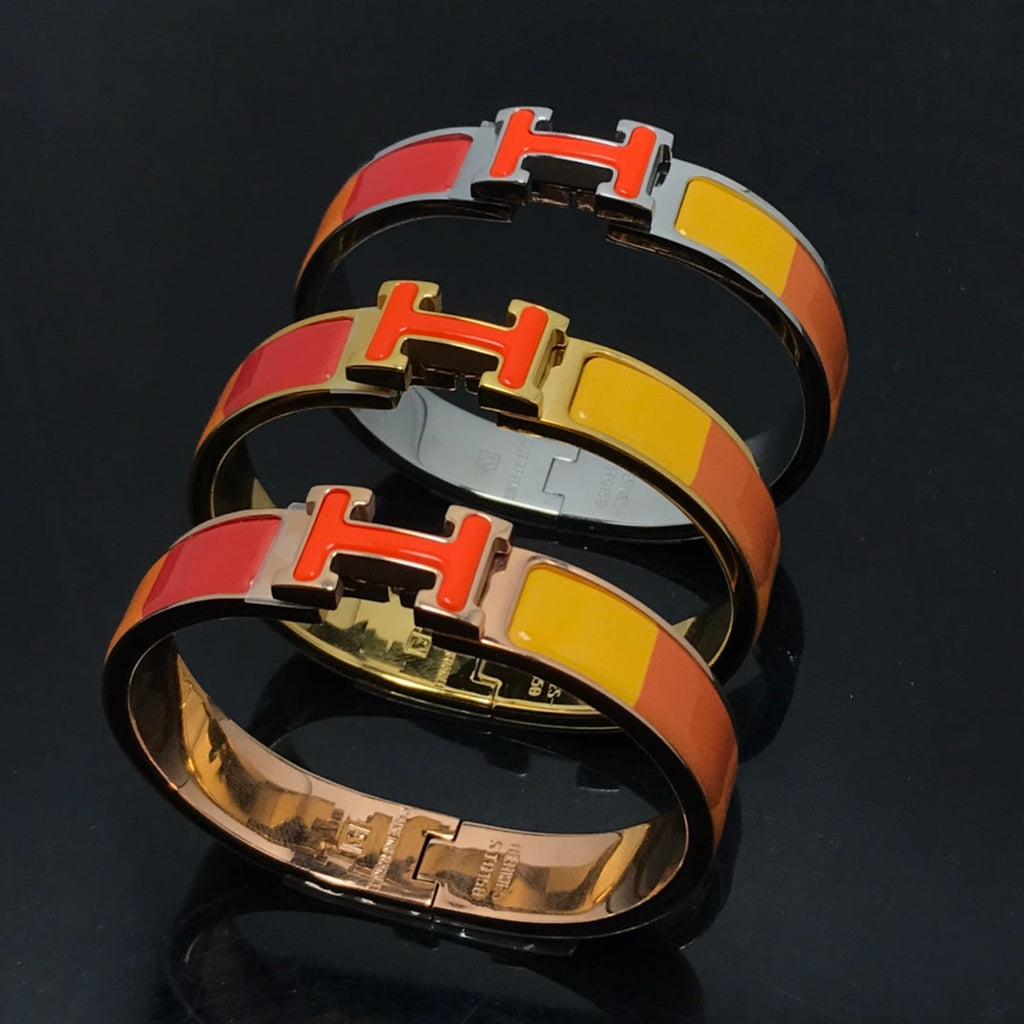 „Dream“-Armband aus orangefarbener Keramik mit Regenbogenfarben