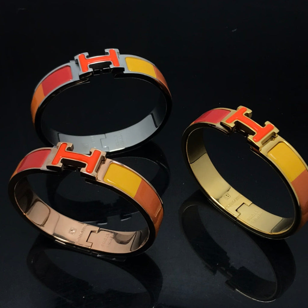 „Dream“-Armband aus orangefarbener Keramik mit Regenbogenfarben