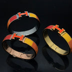 „Dream“-Armband aus orangefarbener Keramik mit Regenbogenfarben
